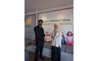 Sheikha Jawaher Receiving the Trophy by Representatives of Indywood Film Festival